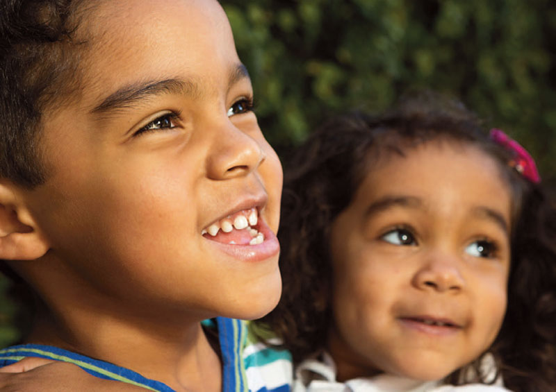 young boy and girl smiling